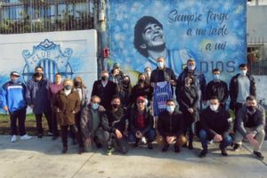 Reconocieron a dos artistas de la ciudad que pintaron un mural de Maradona
