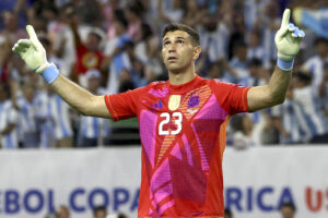 Soccer Football - Copa America 2024 - Quarter Final - Argentina v Ecuador - NRG Stadium, Houston, Texas, United States - July 4, 2024 Argentina's Emiliano Martinez reacts during the penalty shootout REUTERS/Agustin Marcarian